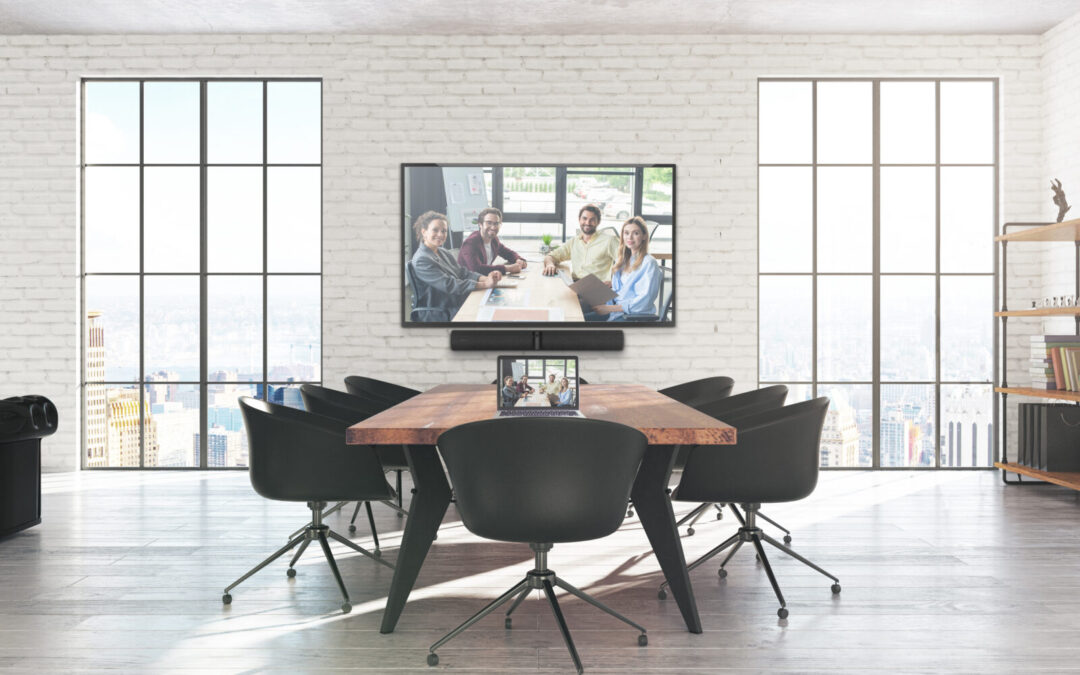 empty conference room with video call on screen